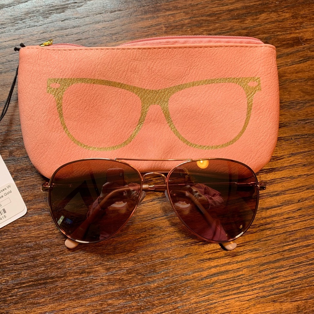 Rose colored reflective lens sunglasses